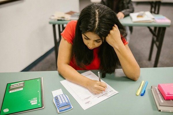 "A student seems confused with her accounting homework and assignment"