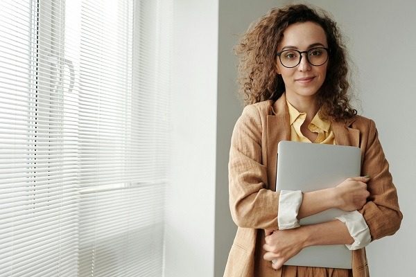 Professional management student with her laptop